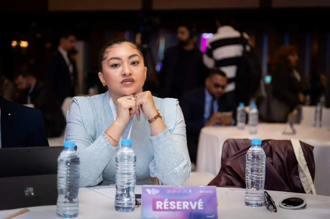 A delegate at a reserved table during the conference