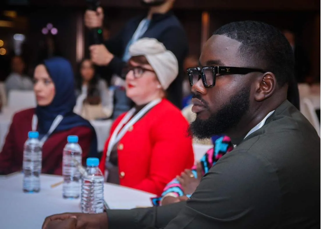 Delegates following a session in the conference hall