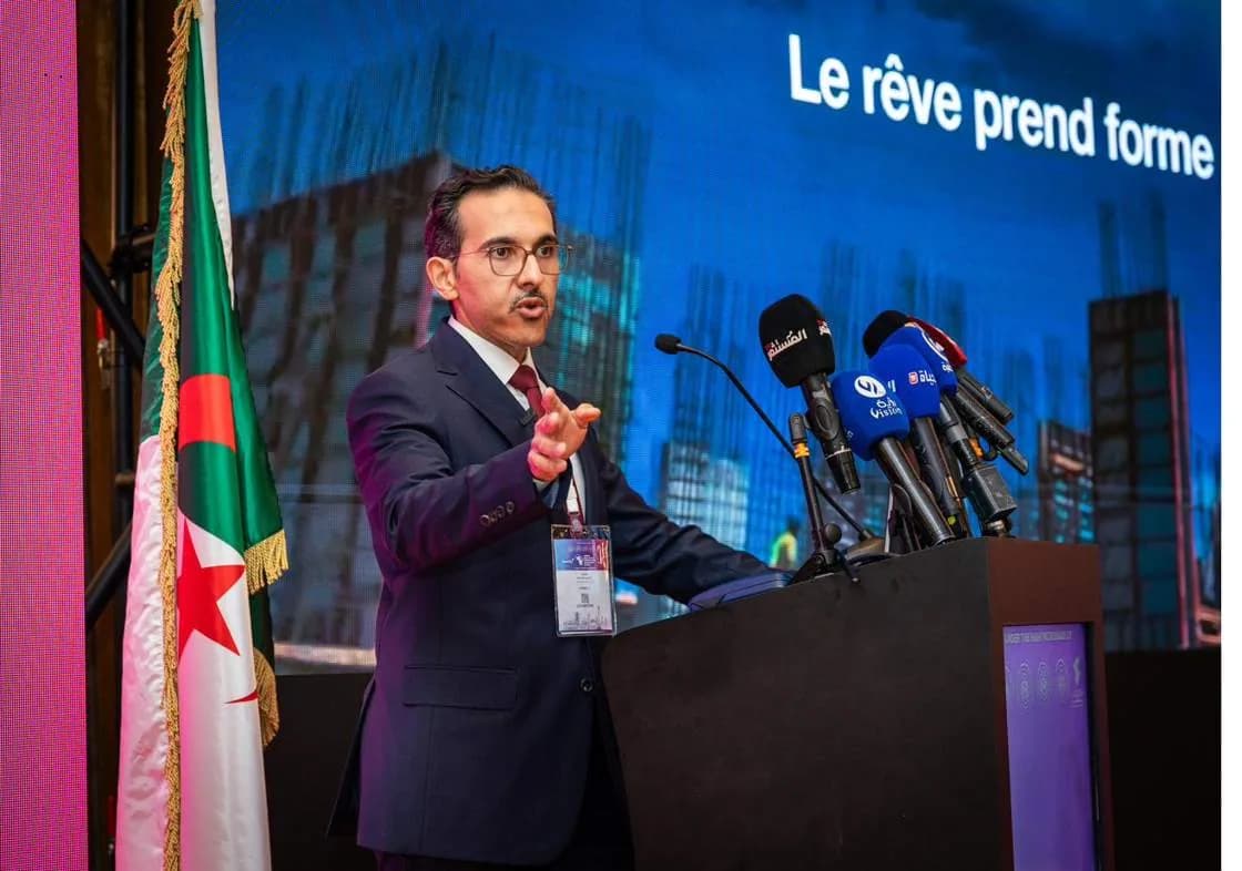 A speaker presenting a development project on the main stage